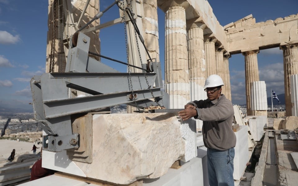 Figure 1. A Worker Hoists A Piece of Marble Inside the Parthenon During Restoration Works