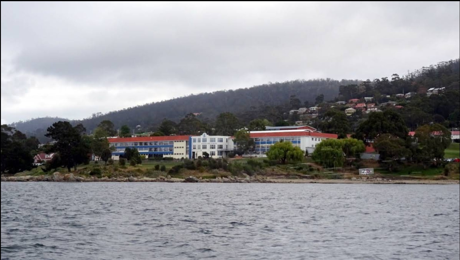 Figure 1. Viewed from the River Derwent, the scale of Taroona High School and its surrounding hillslope system becomes immediately apparent.
